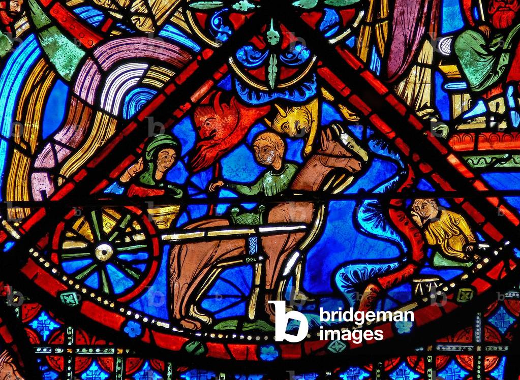 Window w15 depicting the story of St Stephen's relics: devils interfere with the transporting of the relics (stained glass)