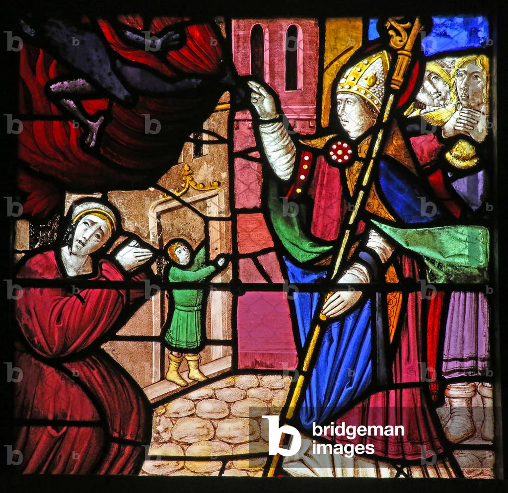 Window w19 depicting the Life of St Remi. He delivers a possessed soul (stained glass)
