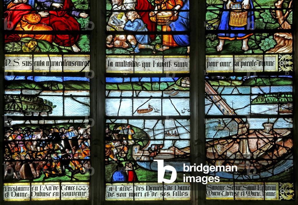 Window w12 depicting Building the bridge over the Seine (stained glass)