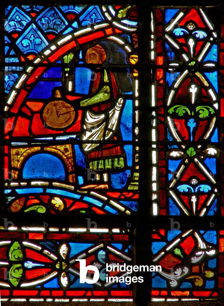 Window w11 depicting a draper donor and border panels (stained glass)