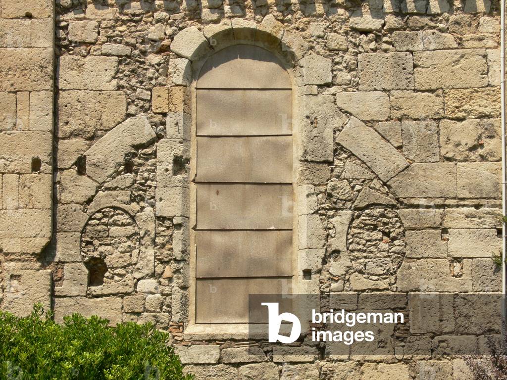 Depicting a view of a blocked up ancient window