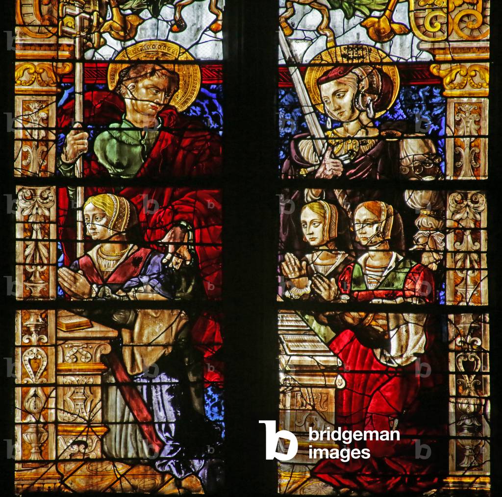 Window depicting Philippe de Serrière with St Philip, two kneeling women and possibly St Yolande (stained glass)