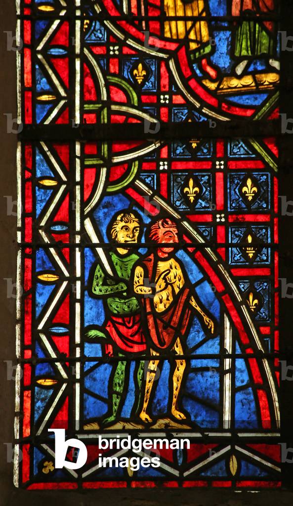 Theophilus is tempted by demons (stained glass)