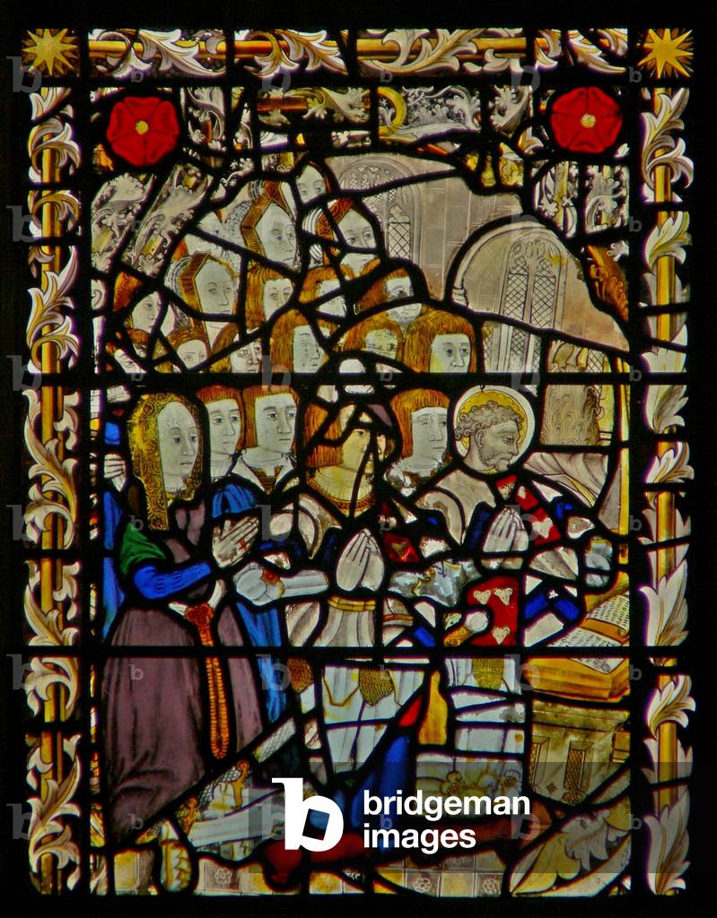 The east window depicting donors - Garnysh family (stained glass)