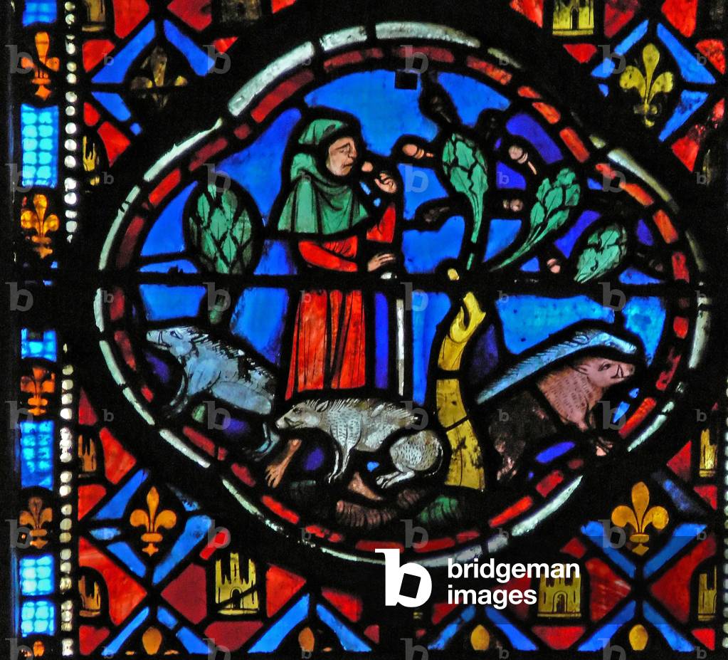 Window Ew-L depicting a scene from the Prodigal Son story: he looks after pigs and thinks (stained glass)