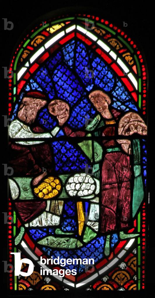 Window Ew depicting a scene from the Prodigal Son story: he receives his inheritance (stained glass)