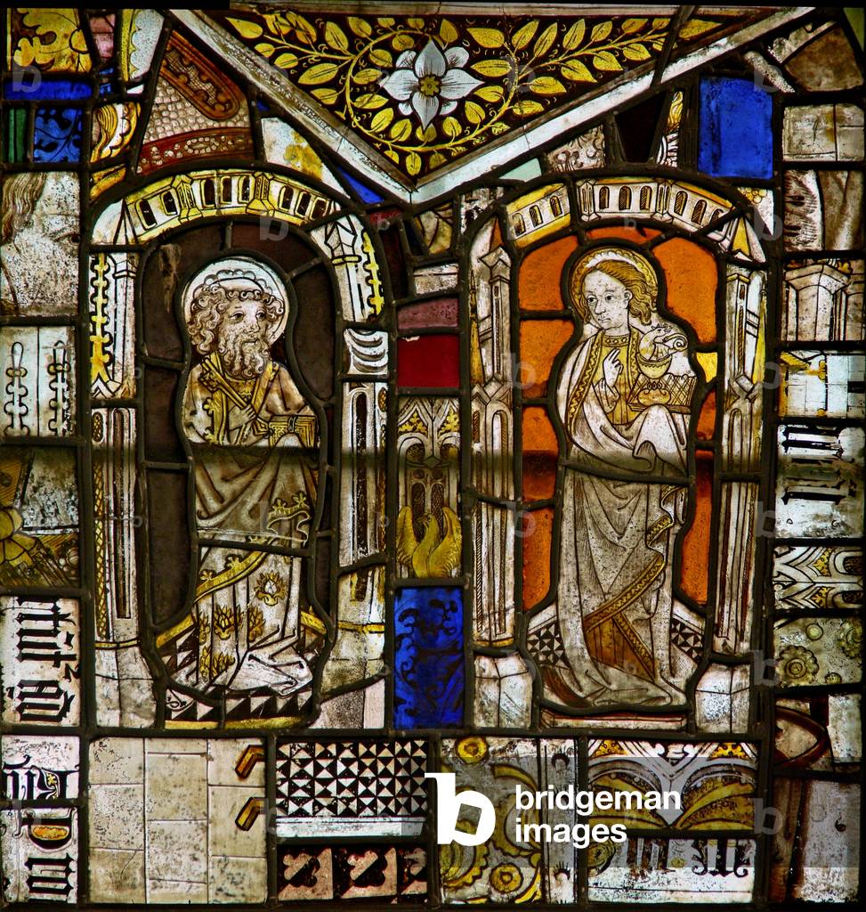 A panel in the east window depicting St Peter and St John; above them is the Gromwell weed (stained glass)
