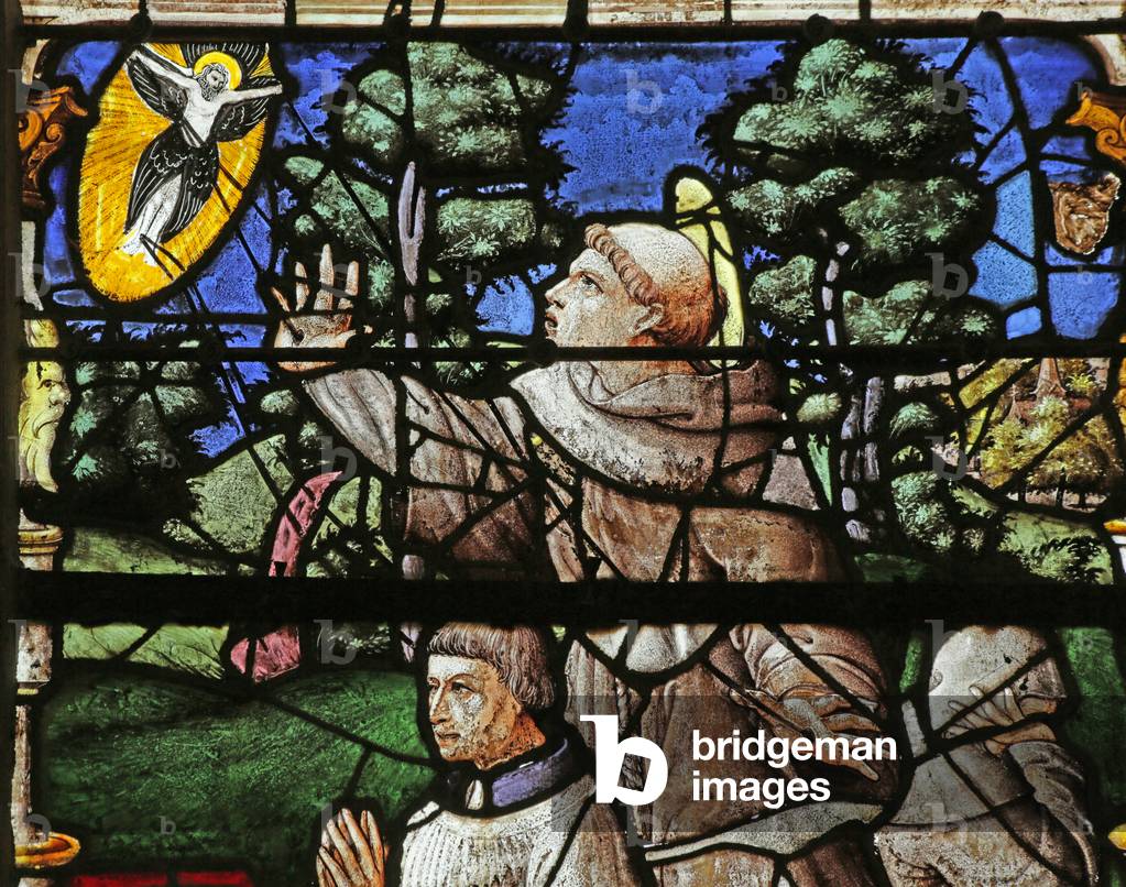 Window depicting the donor with Saint Francis receiving the Saintigmata (stained glass)