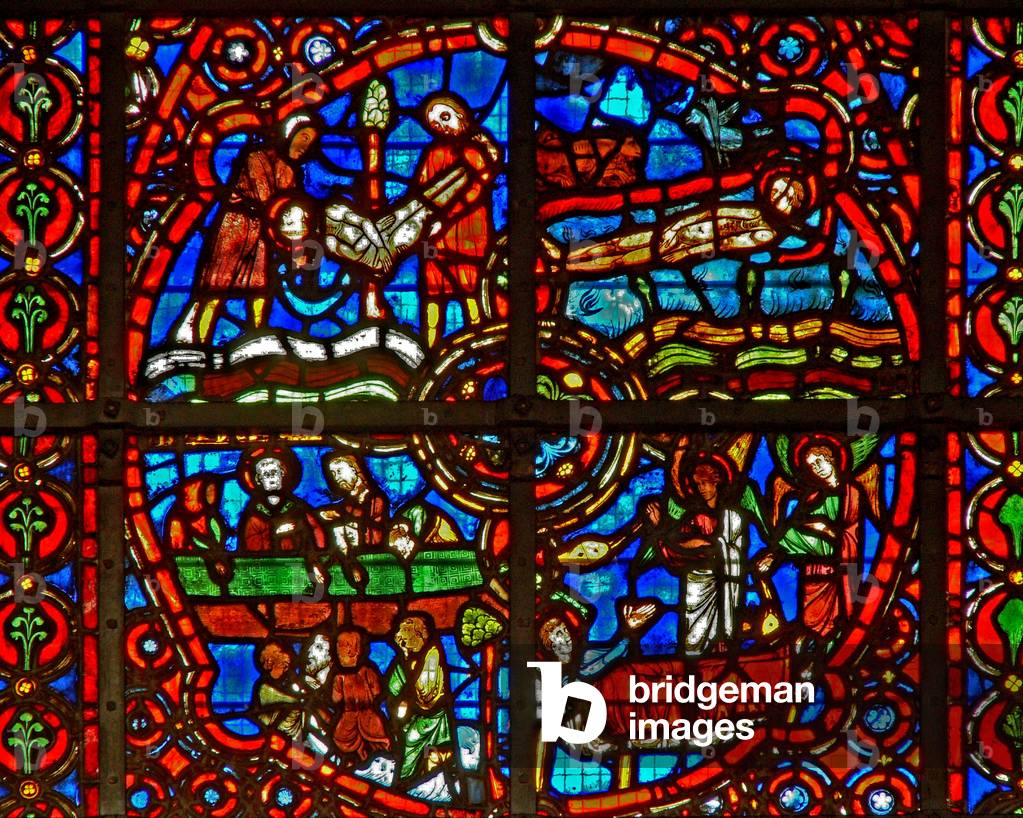 Window w39 depicting scenes from life of St Lawrence (stained glass)