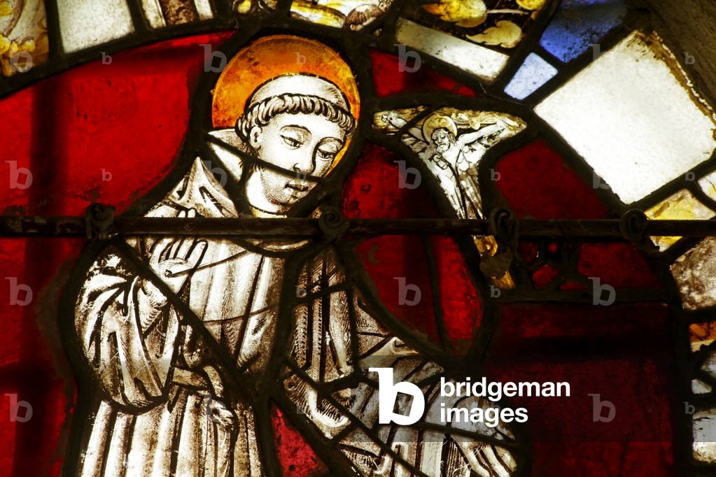 Window depicting Saint Francis as a young Monk having a vision of Christ (stained glass)