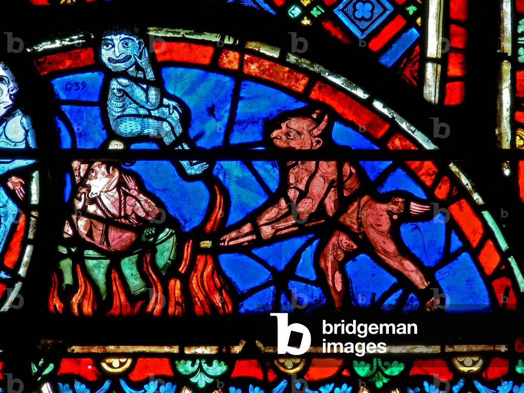 Window w4 depicting an impenitent being tormented by demons (stained glass)