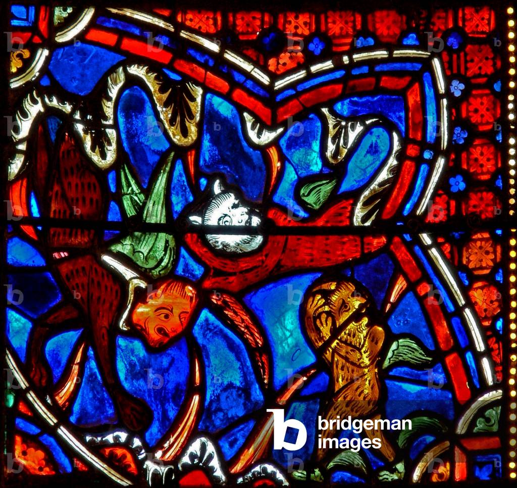 Window w18 depicting St James and demons that get all agitated (stained glass)