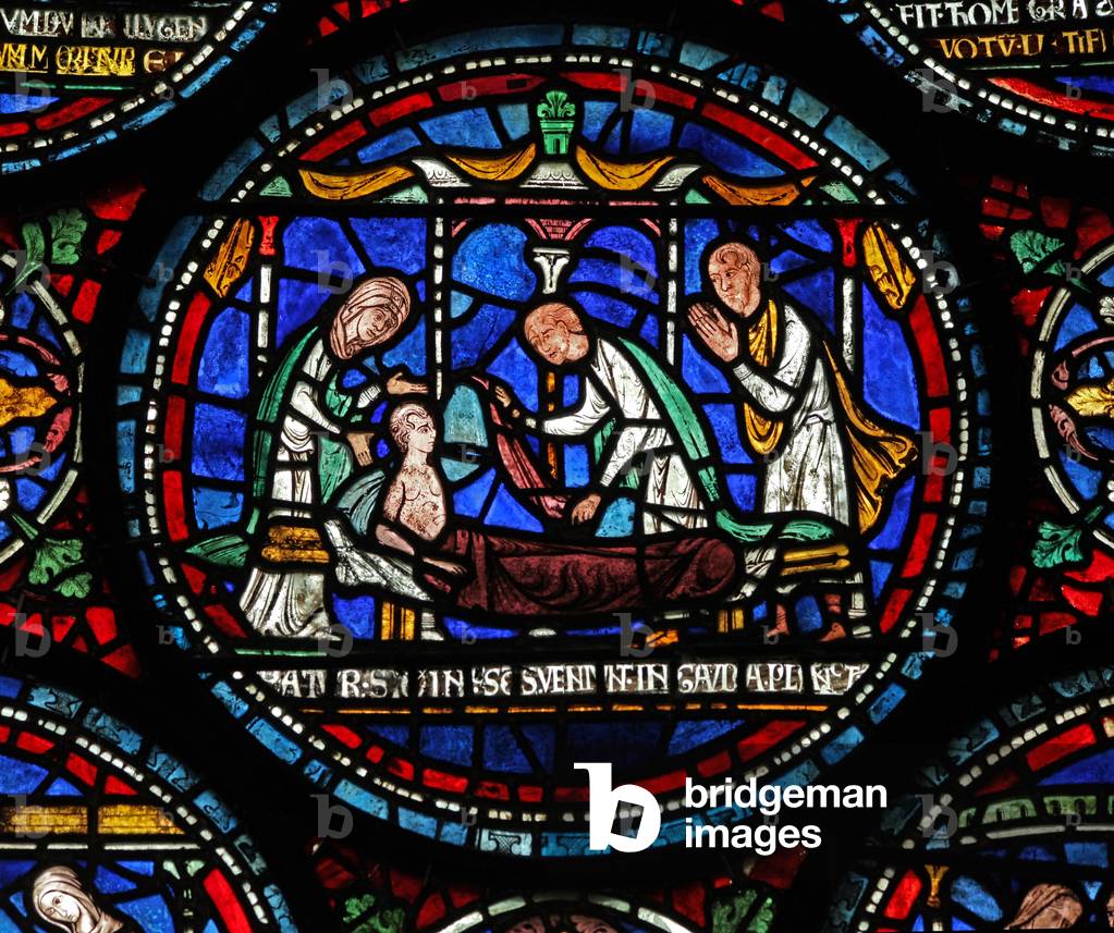 Window s6 depicting a scene from a St Thomas Becket Miracle window: Cicely of Plumstead(?) sits up on her bier (stained glass)