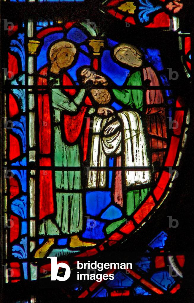Window w8  A holy woman buys a shroud (stained glass)