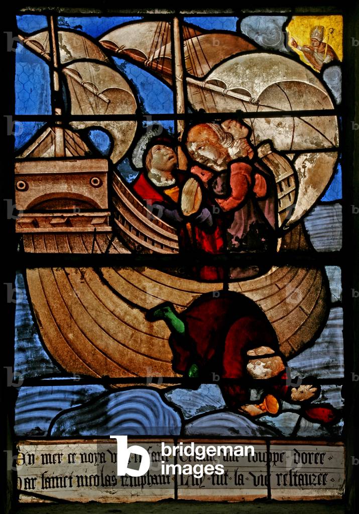 Window w3 depicting a scene from a legend of St Nicholas: the miracle of the boy and the cup: a boy falls overboad and looses a golden cup (stained glass)