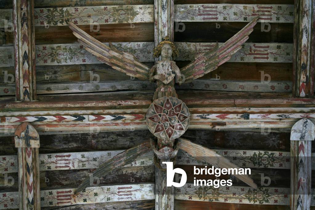 Depicting a view of one of the carved wooden angels in the nave