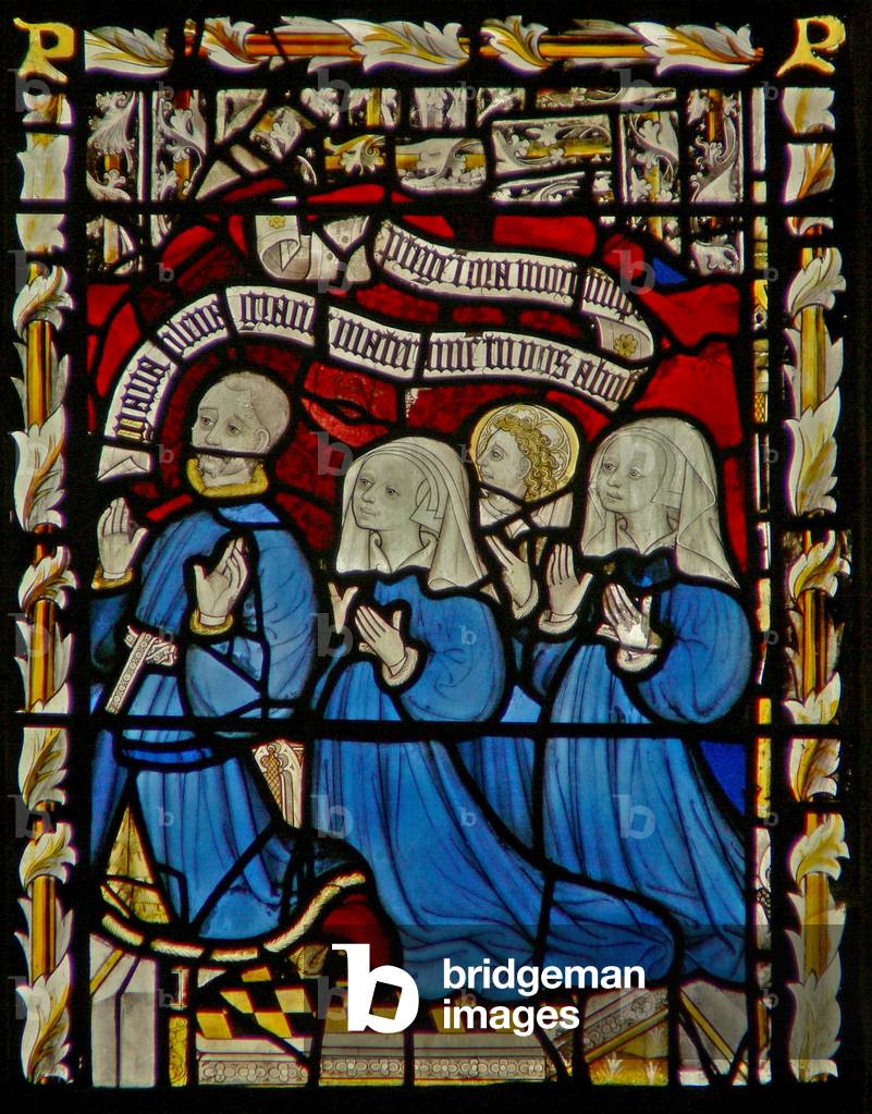 The east window depicting donors (stained glass)