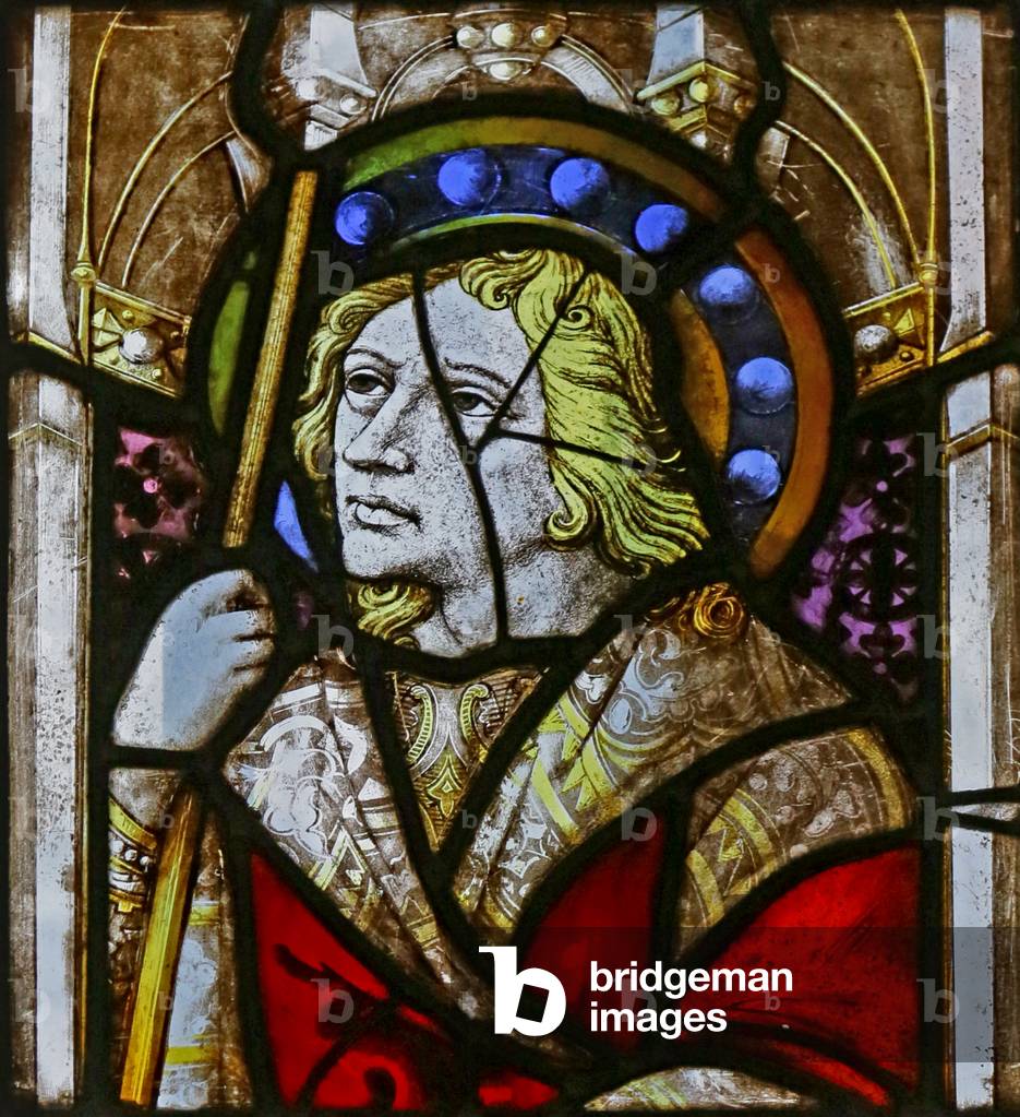 Young saint with unusual halo (stained glass)