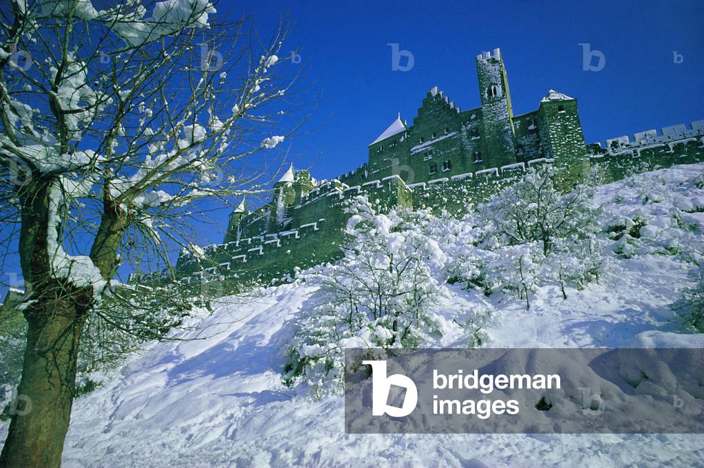 Cite of Carcassonne in winter. Chateau comtal under snow.