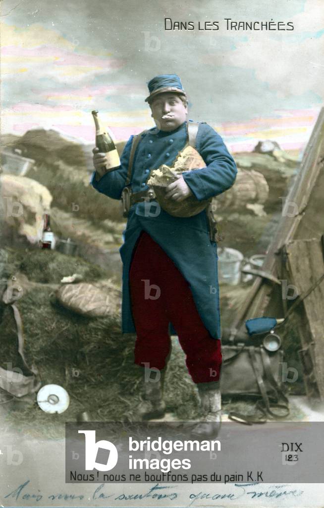 WWI postcard, Poilu in the trenches with bottles of wine, sprinkling with a loaf of bread making fun of German bread (KK bread). (photo)