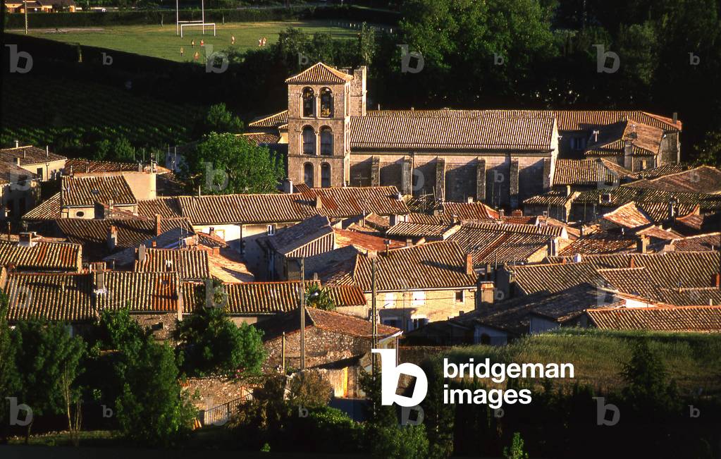 Typical village in the south of France: Caunes - Minervois, its tiled roofs and its Romanesque abbey