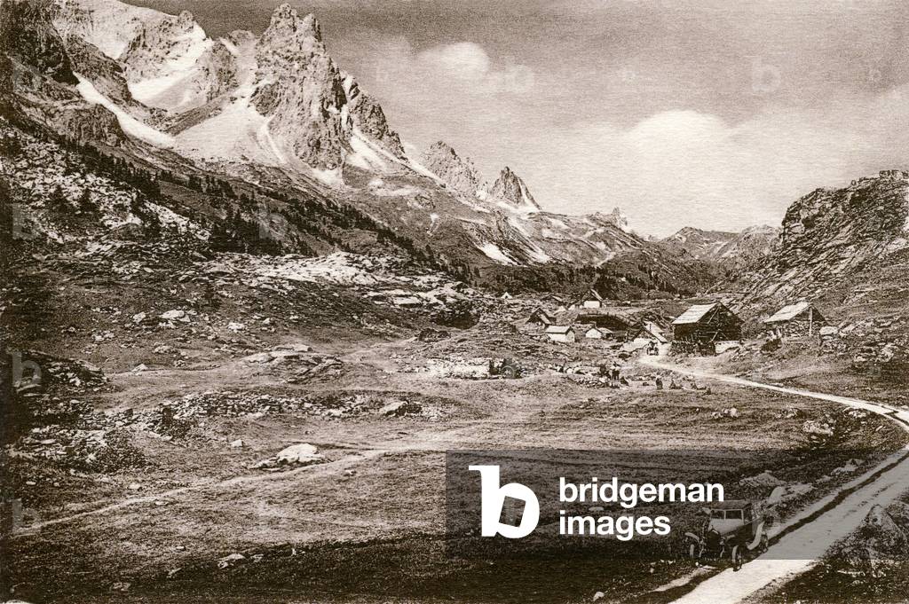 Le Dauphine at the beginning of the 20th century: high vallee de la Claree, chalets of Laval (1960 meters), terminus of the motorable road - at the bottom: the Aiguille Noire and the Col des Rochilles - automobile - Alps, alpine pastures, mountain life - period postcard -
