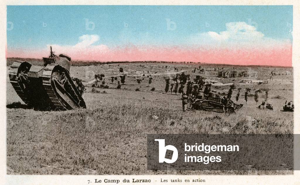 Here in operation at Camp du Larzac, the Renault FT-17 tank, the manufacture of which was initiated by Colonel Estienne, is the best known armoured vehicle of the First World War. This caterpillar self-gun, produced in approximately 3500 copies, influenced the weapons industry around the world by fixing the very type of battle tank, using a turret weapon. It's the first to have a 360° swivel turret. It remained in service in the French army until the beginning of the Second World War, and was then used by the German Wehrmacht for occupation and training tasks. Postcard published at the end or shortly after the 1st World War.
