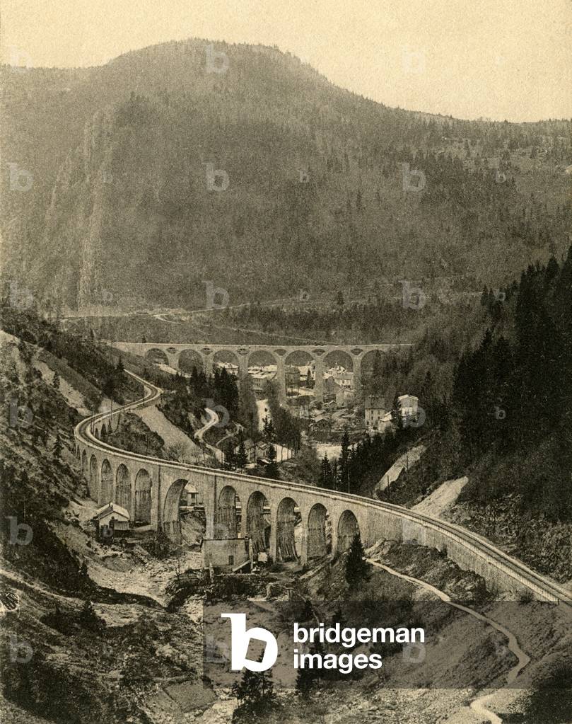 Morez-du-Jura: railway line called “Swallows line” and its viaducts - Bas de Morez viaduct on a Morez-Saint-Claude railway line and Evalude viaduct on the Morbier-Morez line - Jura postcard beginning 20th century - The architect of this viaduct is Paul Sejourne (1851 -1939 - PLM engineer). It is located on the line from Andelot-en-Montagne to La Cluse, on the section of line from Morez to Saint-Claude. Its 203 meters span the Vallee de l'Evalude at 40 m high. It has been listed as a historical monument since 1984.