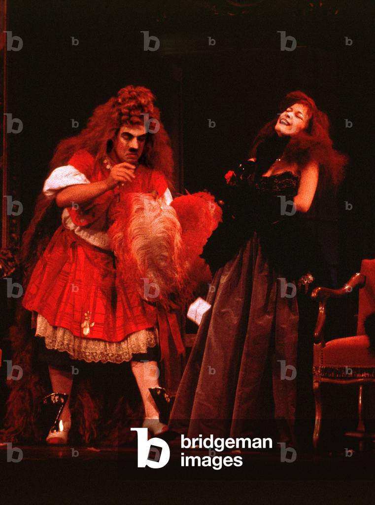 Jerome Savary playing “Le bourgeois gentilhomme”” by Moliere with the Grand Magic Circus in 1985. Mr. Jourdain in his new costume provokes the laughing of his handmaid Nicole (Aurelie Balte). Photo by Patrice Cartier