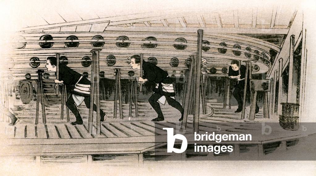 Traditional Japanese theater: the machinists operate the rotating platform of the stage, 1900 (illustration)