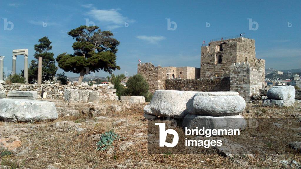 Lebanon: view of the site of Byblos (Goubla, Jebal, Gebal, Jbeil): Roman colonnade of the 3rd century and castle of the Croises, built in the 12th century on Phenician and Roman foundations, using the stones of ancient ruins -