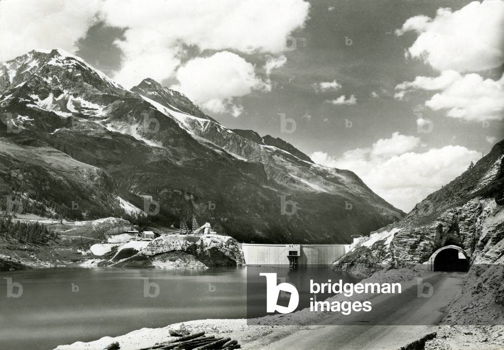 Tigne dam, the artificial lake being filled (postcard, ca. 1952)