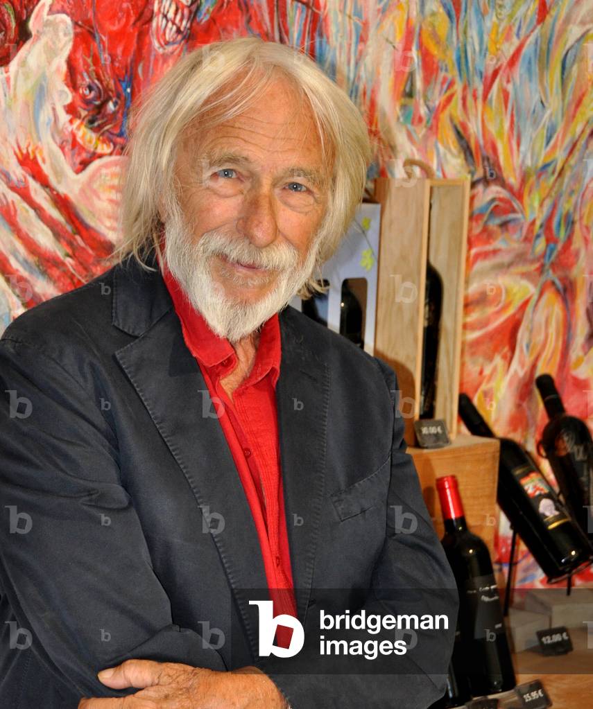 French actor Pierre Richard (Pierre-Richard Defays) on August 30, 2016 in the cellar of his winery Bel Eveque in Gruissan (Aude, Languedoc, Occitanie), in front of the wine bottles of his production - Photo Patrice Cartier -