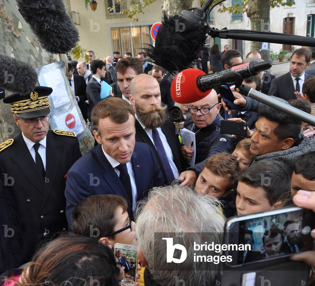 President Emmanuel Macron takes a crowd bath under the microphones of the media, South of France. 2018 (photo)
