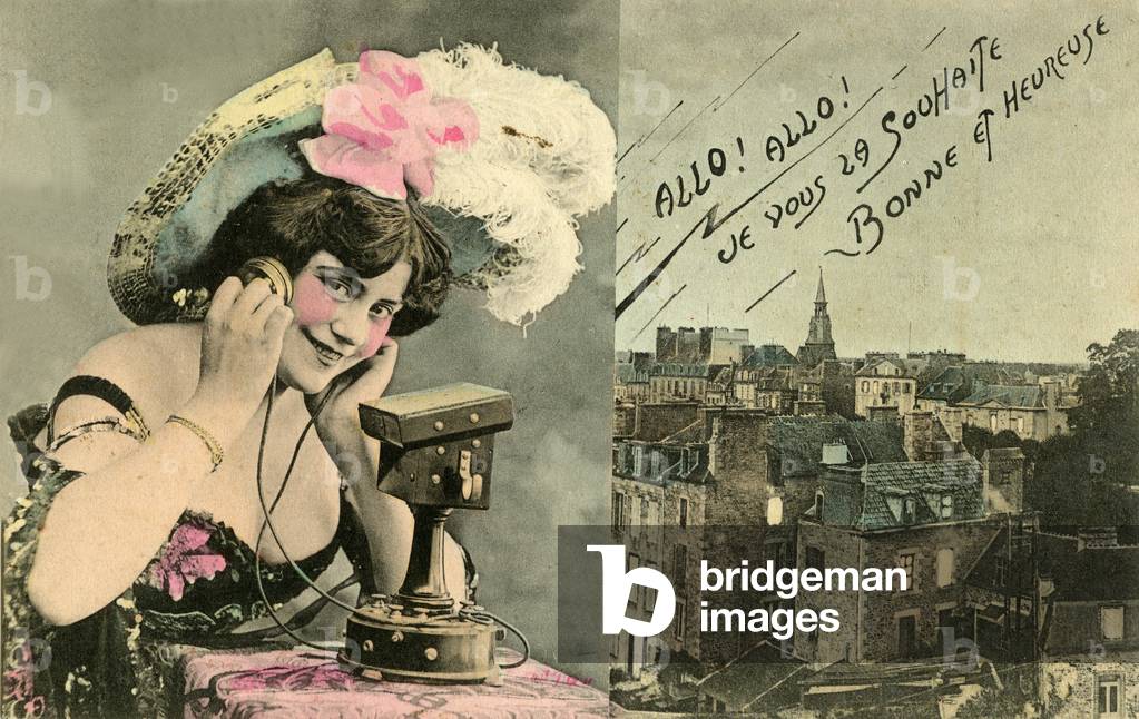 Young woman sending her happy New Year wishes by phone. Mobile Ader phone. Postcard 1906