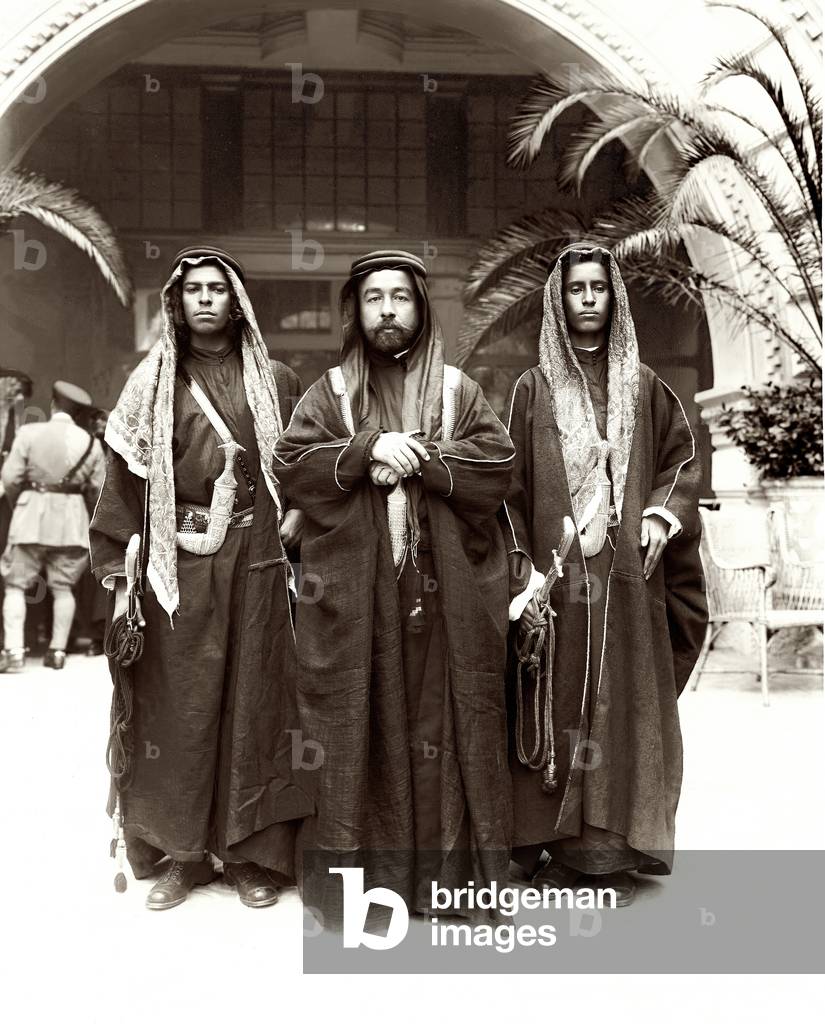 Sherif Abdullah (centre) with Sheikh Jwayber el-Otaiby (right) of the Otaibeh Tribe, 1921 (b/w photo)