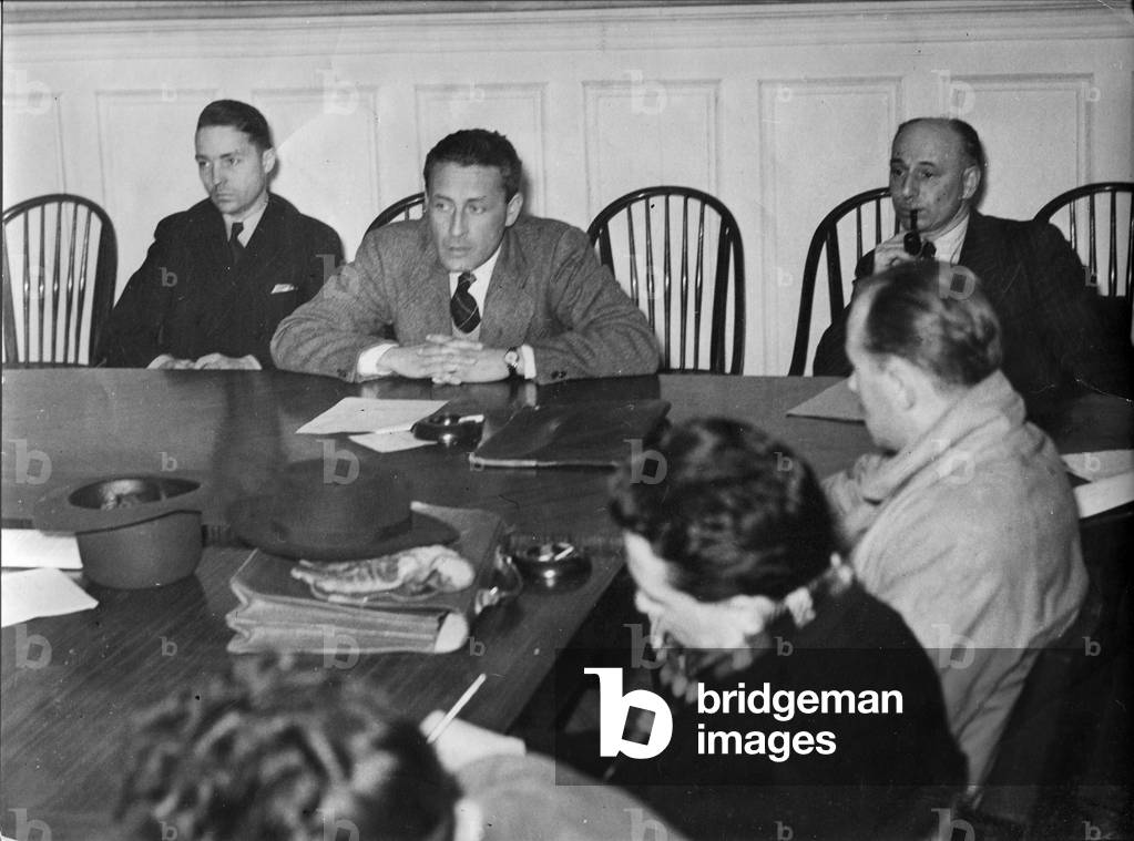 April 3, 1947, Paul-Emile Victor receives journalists to expose what will be the French Polar Expeditions (EPF), officially created on the previous February 28, Paris, France, April 1947 (b/w photo)