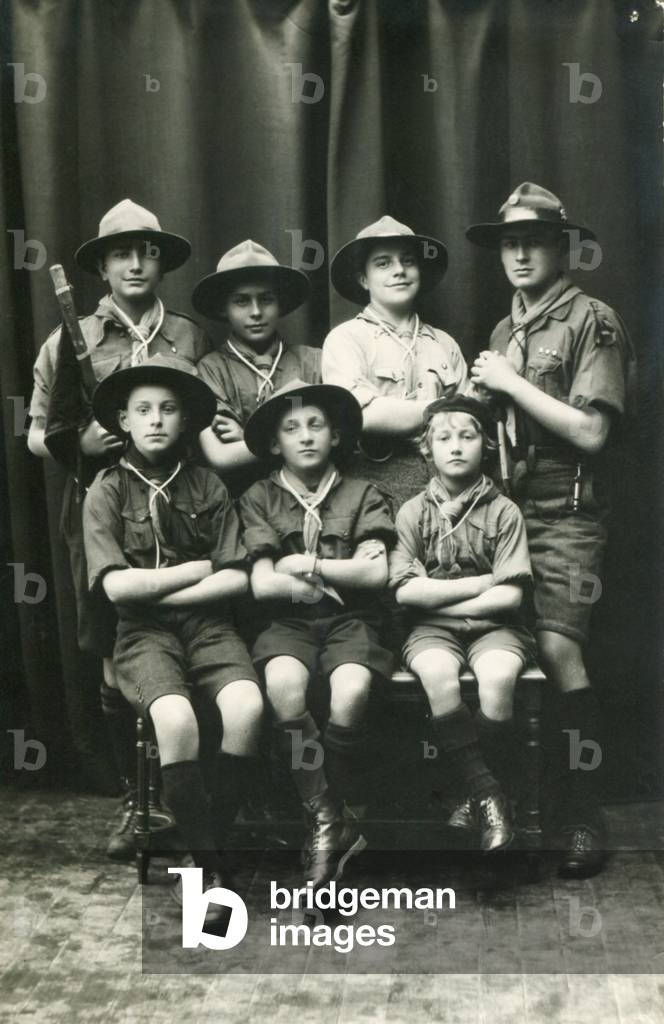 Paul-Emile Victor, a smiling Tiger, is deputy leader of the French Encoureurs de France. Here, with his clan, Lons-le-Saunier, Jura, France, 1927 (b/w photo)