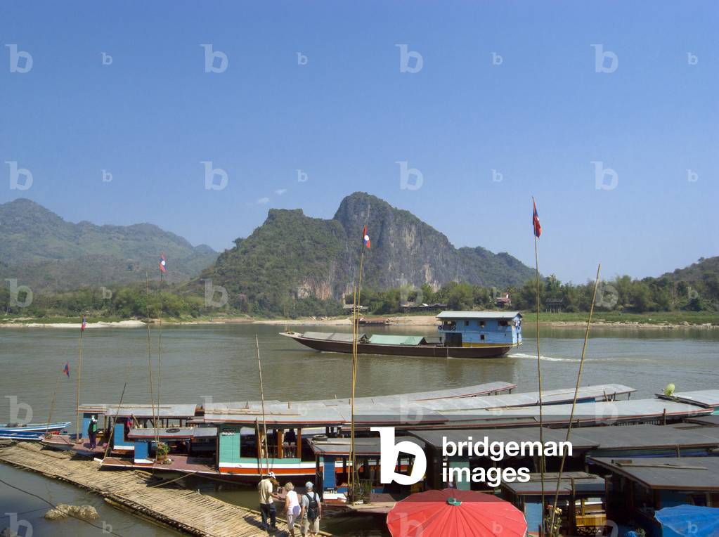Laos: Boats at Pak Ou on the Mekong River, north of Luang Prabang