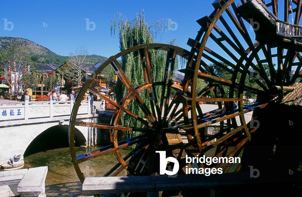 China: Waterwheels at the edge of Lijiang Old Town, Yunnan Province