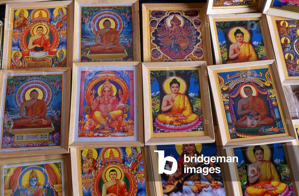 Sri Lanka: Religious iconography for sale in a shop in Old Galle