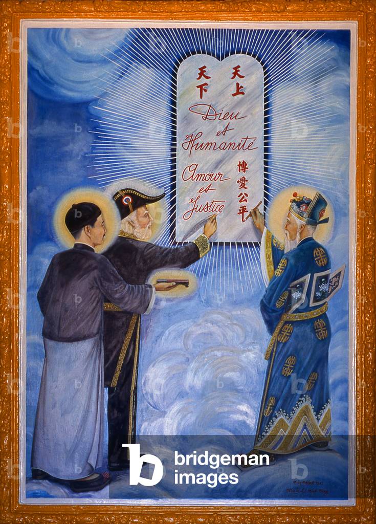 Vietnam: The 'Third Alliance Between God and Man' painting in the entrance to the  Cao Dai temple shows Sun Yat-sen (left), Victor Hugo and Vietnamese poet Nguyen Binh Khiem (right),  Cao Dai Holy See, Tay Ninh Province