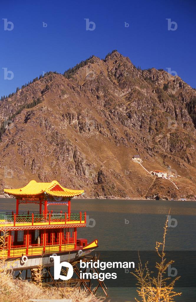 China: A new pleasure boat under construction on the edge of Tian Chi (Heaven Lake) in the Tian Shan (Heavenly Mountains), Xinjiang Province (photo)