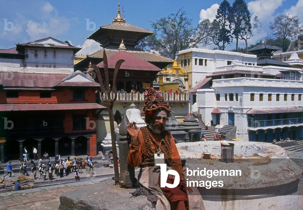 Nepal: A sadhu (holy man) across the Bagmati River next to the Pashupatinath Temple complex, Kathmandu (1997)