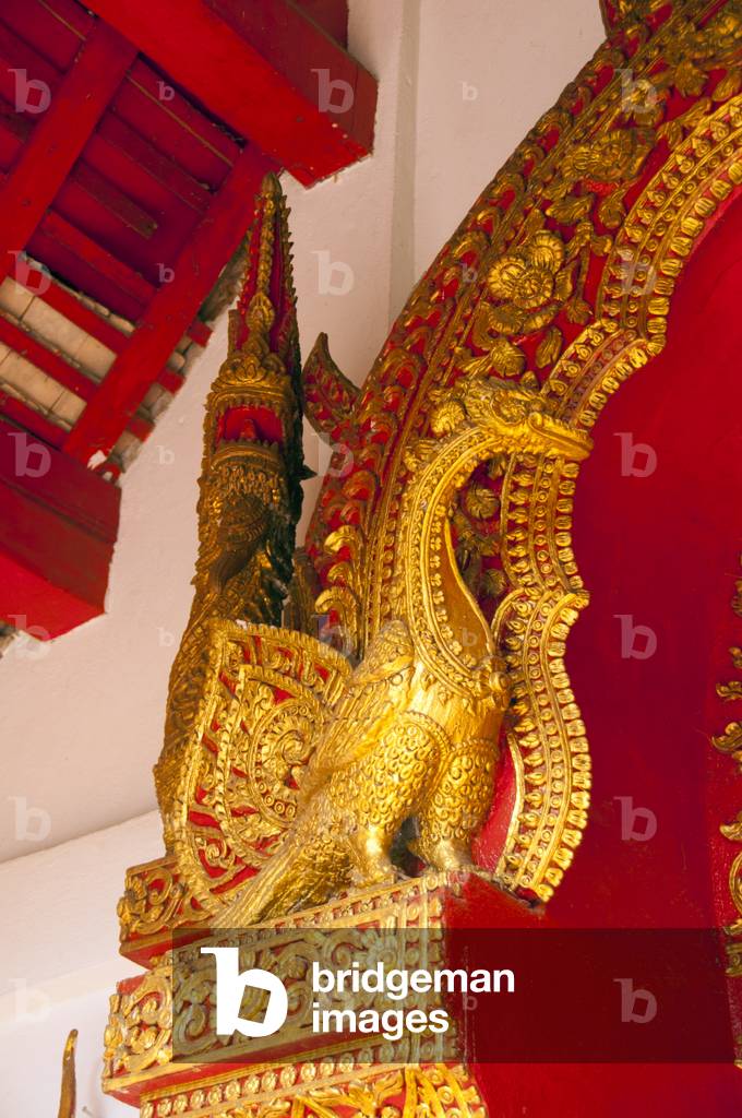 Thailand: Hamsa (sacred swan or goose) over the front door of the viharn at Wat Phuak Hong, Chiang Mai