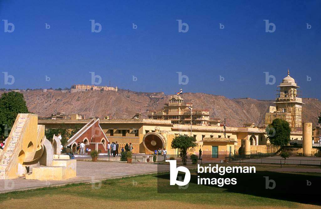 India: The Jantar Mantar, Maharaja Sawai Jai Singh's 1728 astronomical observatory, (the Nahargarh Fort stands atop the hill in the background), Jaipur, Rajasthan