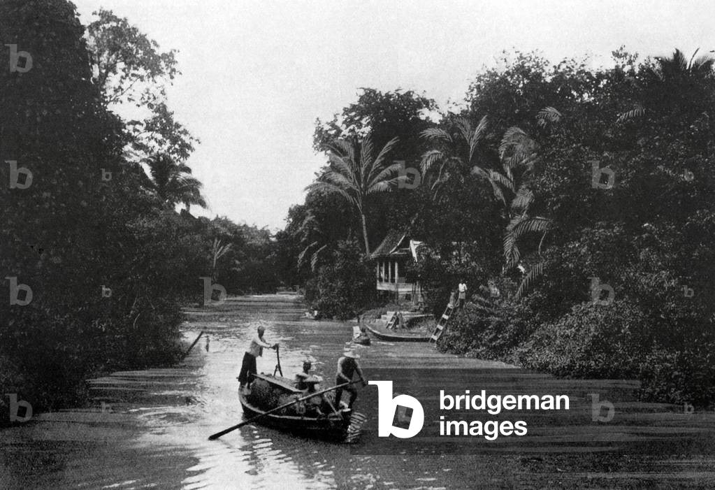 Thailand: A Bangkok canal scene with, on the right, the entrance to a Buddhist temple, c. 1900