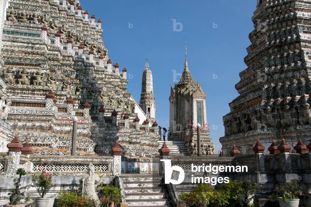 Thailand: Tourists at the Khmer-style central prang at Wat Arun (Temple of Dawn), Bangkok
