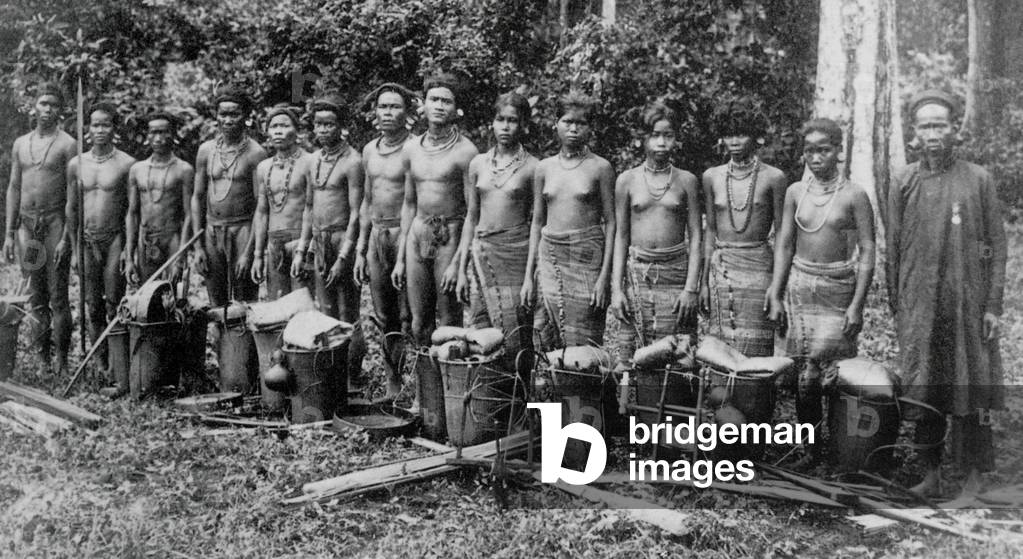 Cambodia: ethnic Stieng villagers line up for a photograph in the Srepok region of Cambodia in 1920.