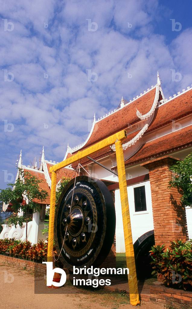 Thailand: Giant gong set up for Songkran (Thai New Year Water Festival) in the grounds of Wat Chetlin, Chiang Mai